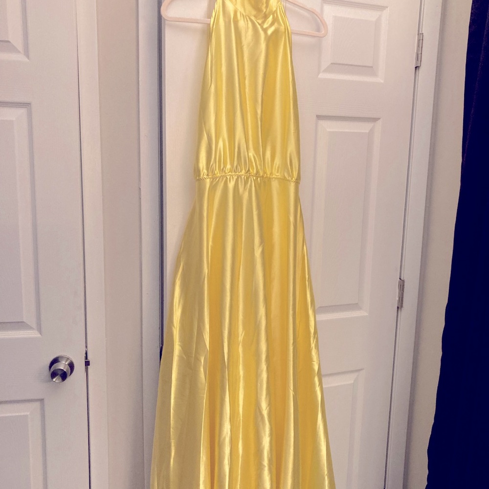 Beautiful new never worn yellow satin backless halter dress.